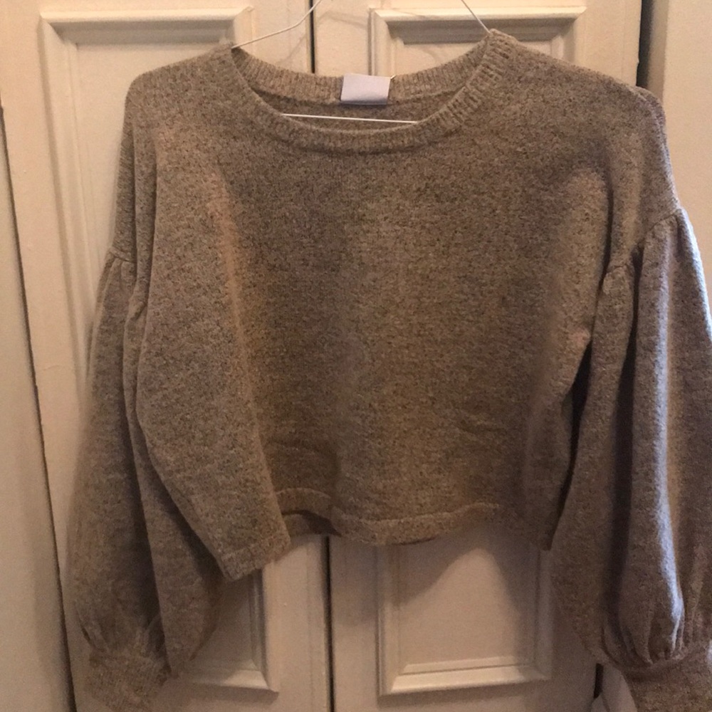 Brand new Donna Mizani sweater